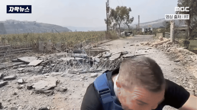 [자막뉴스] '설마?' 눈 커진 기자 뒤 '쾅'.. "추가 공습" 생중계 순간 (2026.03.20 MBC뉴스) | 인스티즈